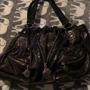 Black, metallic, multiple zipper purse